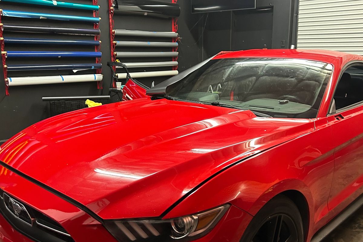 Red Mustang before vinyl wrap
