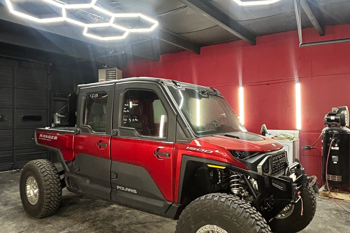 Red Polaris side-by-side before